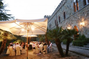 round tables outside wedding in italy castle borgia